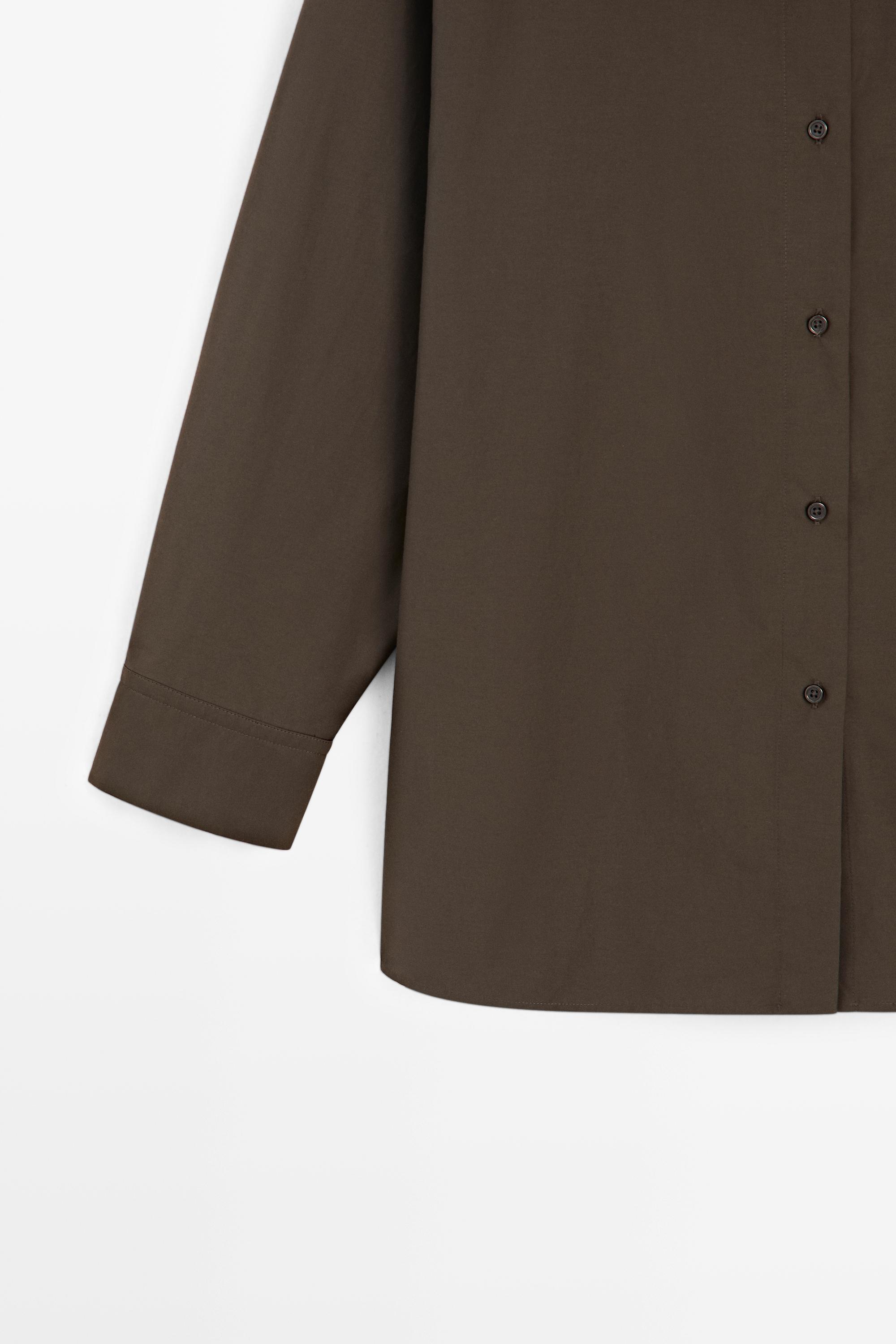 High collar overshirt with buckle detail